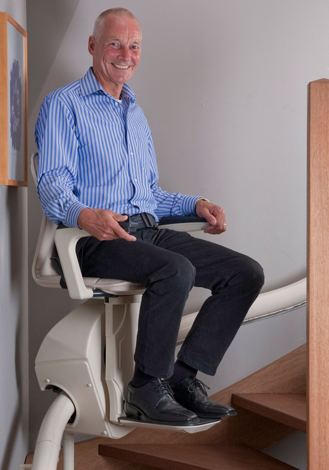 man on moving stairlift